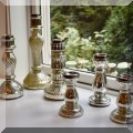 D25. Mercury glass candlesticks. 